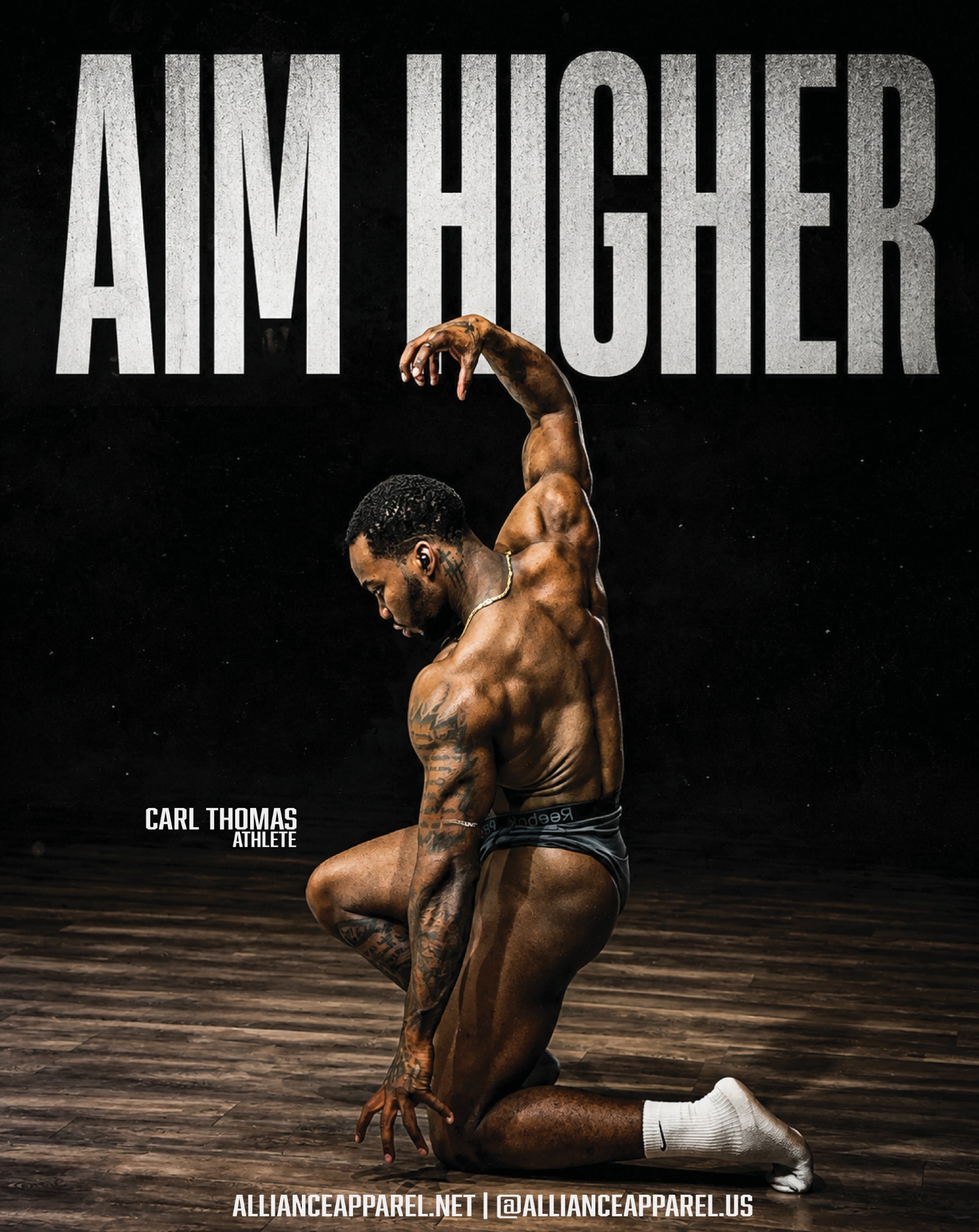 ALLIANCE founding athlete Carl Thomas posing beneath the words Aim Higher